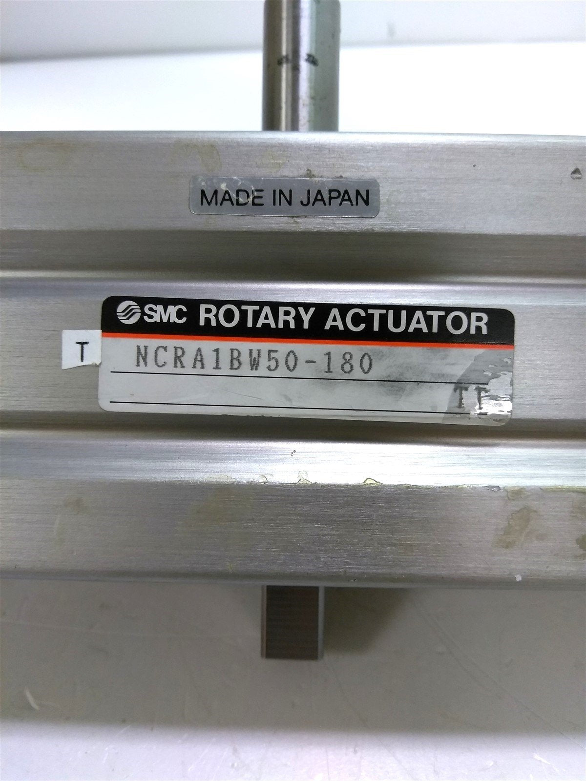 Used SMC NCRA1BW50-180 Pneumatic Rotary Actuator, Dbl. Rod, 50mm Bore, 180Degree Rot.