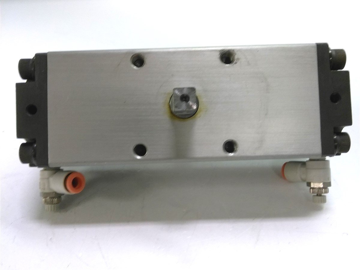 Used SMC NCRA1BW50-180 Pneumatic Rotary Actuator, Dbl. Rod, 50mm Bore, 180Degree Rot.