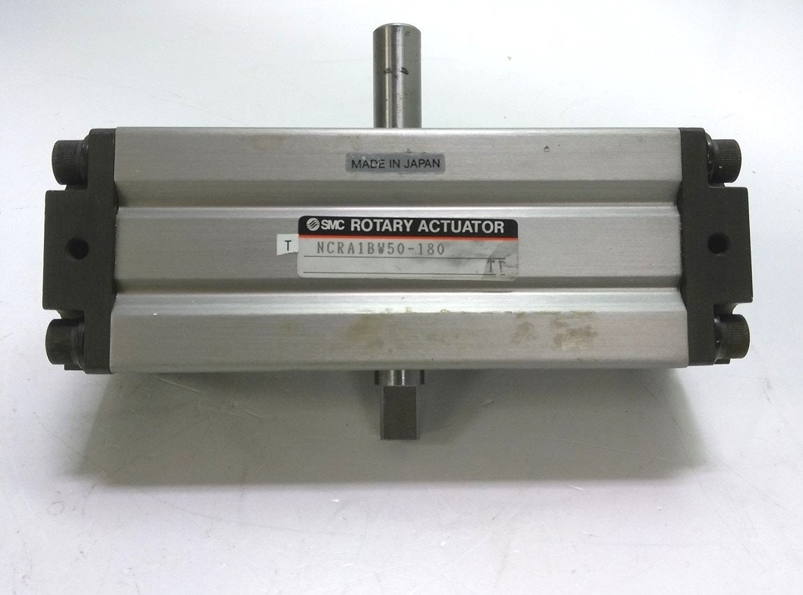 Used SMC NCRA1BW50-180 Pneumatic Rotary Actuator, Dbl. Rod, 50mm Bore, 180Degree Rot.