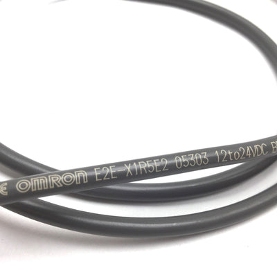 Used Omron E2E-X1R5E2 Proximity Sensor, Range: 1.5mm, Barrel: M8, 12-24VDC, 3' Cable