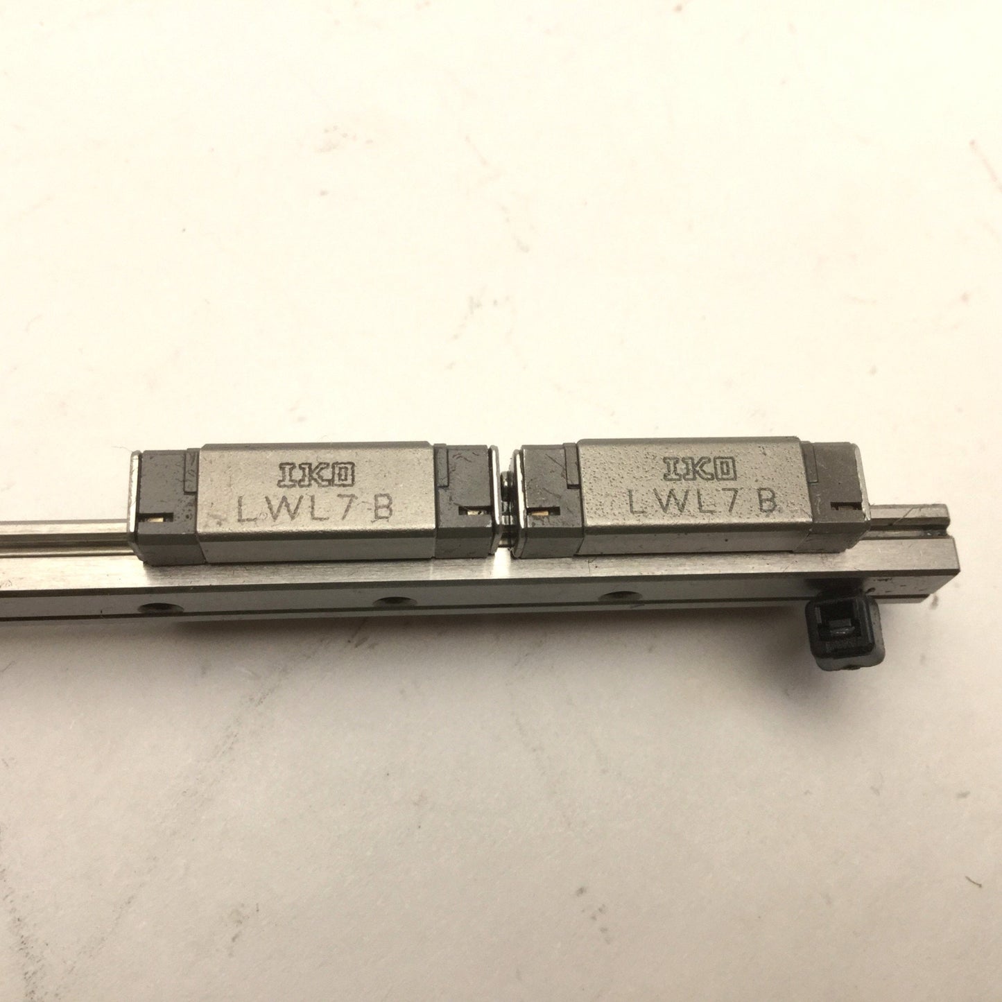 Used Bank of 2 IKO LWL7B Ball Bearing Carriages on 119mm Rail, Carriage: 17mm x 23mm