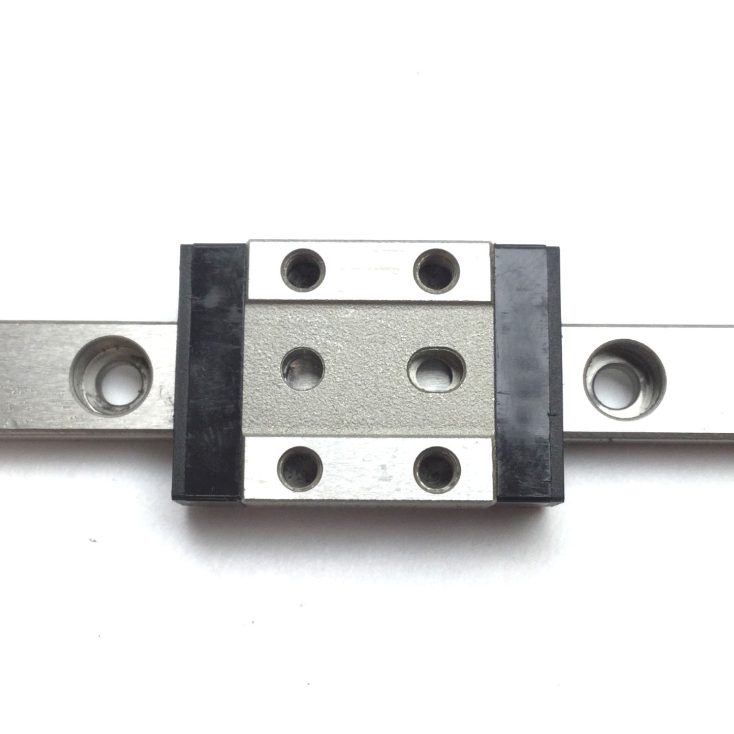 Used Misumi SSEBN10 Miniature Linear Guide, Rail: 115mm, Slide: 20mm x 30mm x 10mm