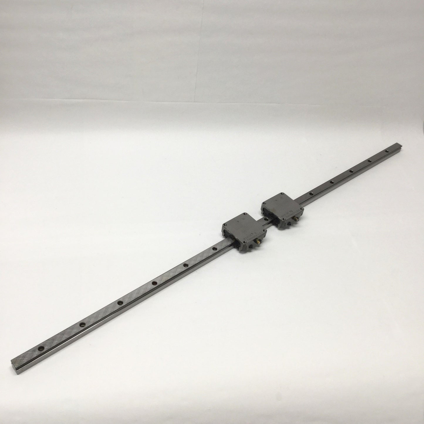 Used IKO LWA 15 Adjustable Preload Linear Ball Bearing Carriages (x2) on 865mm Rail